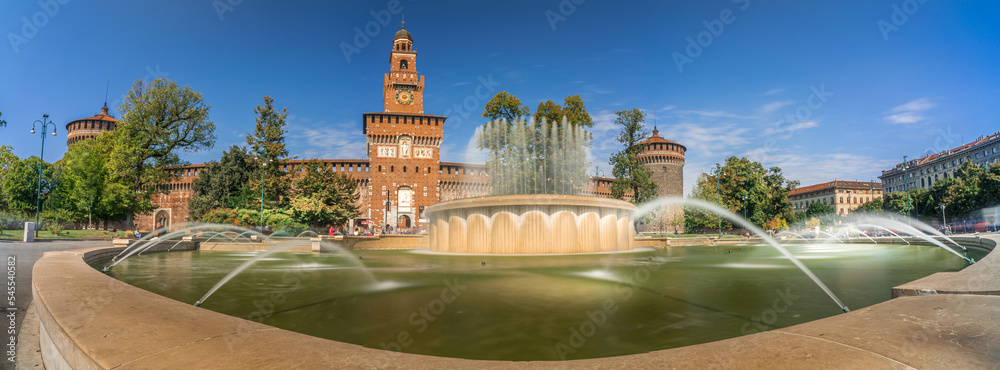 Naklejka premium Panoramic view of Castello Sforzesco square with fountain in Milan, Italy. Long Exposure.