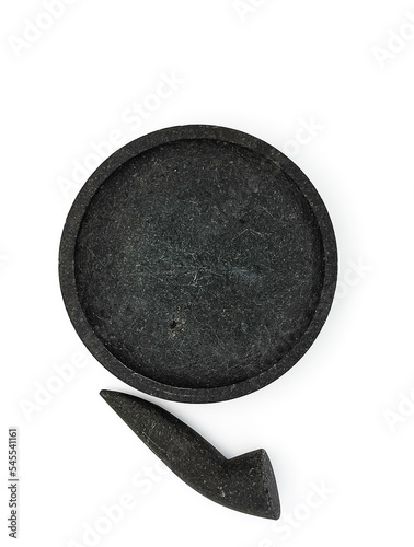 Unique traditional mortar and pestle, stone craft made for mashing seasoning purpose, Cobek and Munthu or Ulekan. Isolated on white background with copy space. Top view or flatlay. photo