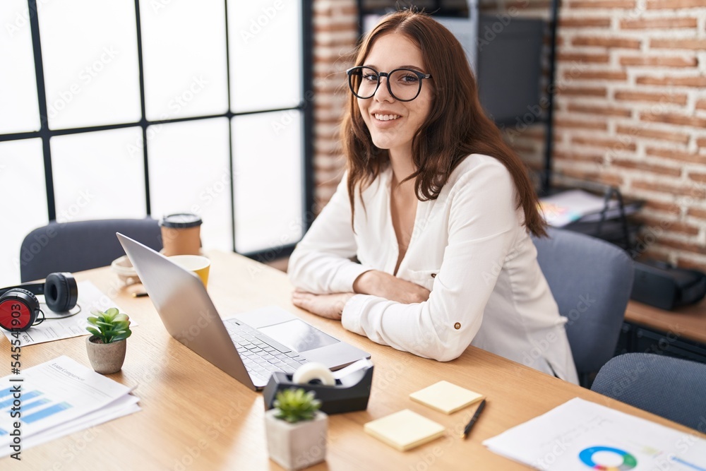Young woman business worker using laptop working at office Young woman business worker using laptop working at office