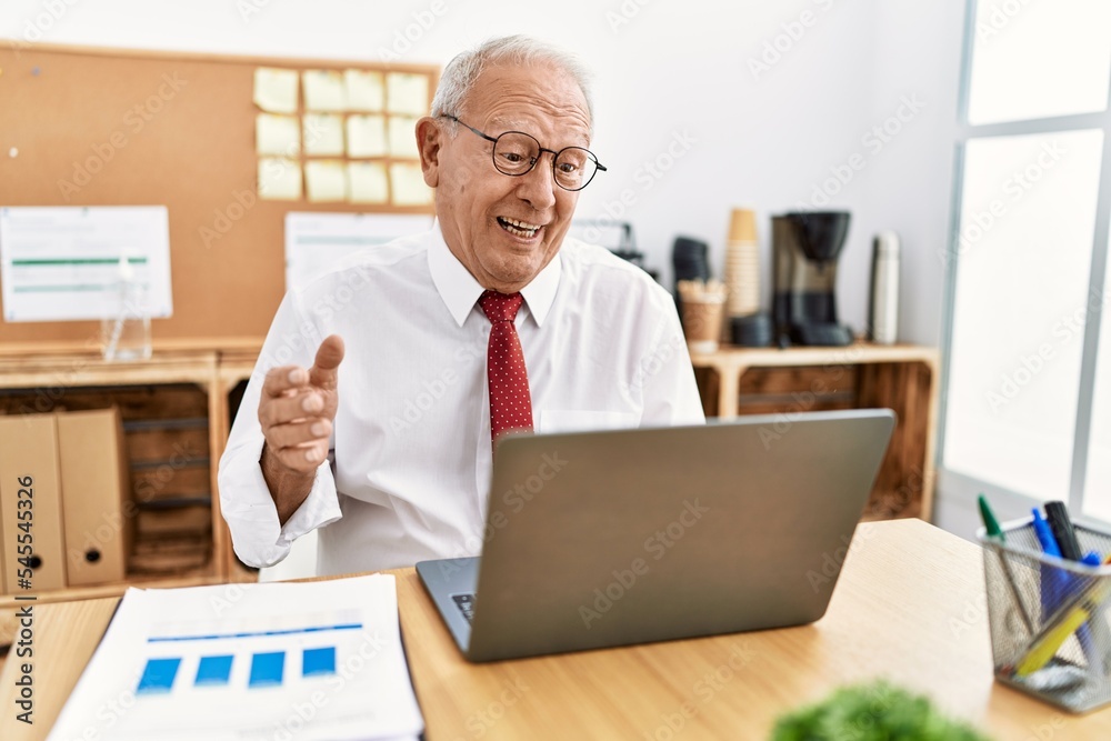 Senior man business worker having video call at office Senior man business worker having video call at office
