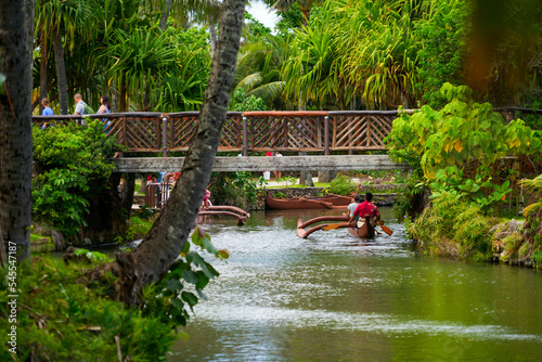 Laie, Hawaii - February 21, 2022 : Outrigger canoe river tour at the Polynesian Cultural Center on the North Shore of O'ahu island in Hawaii, United States