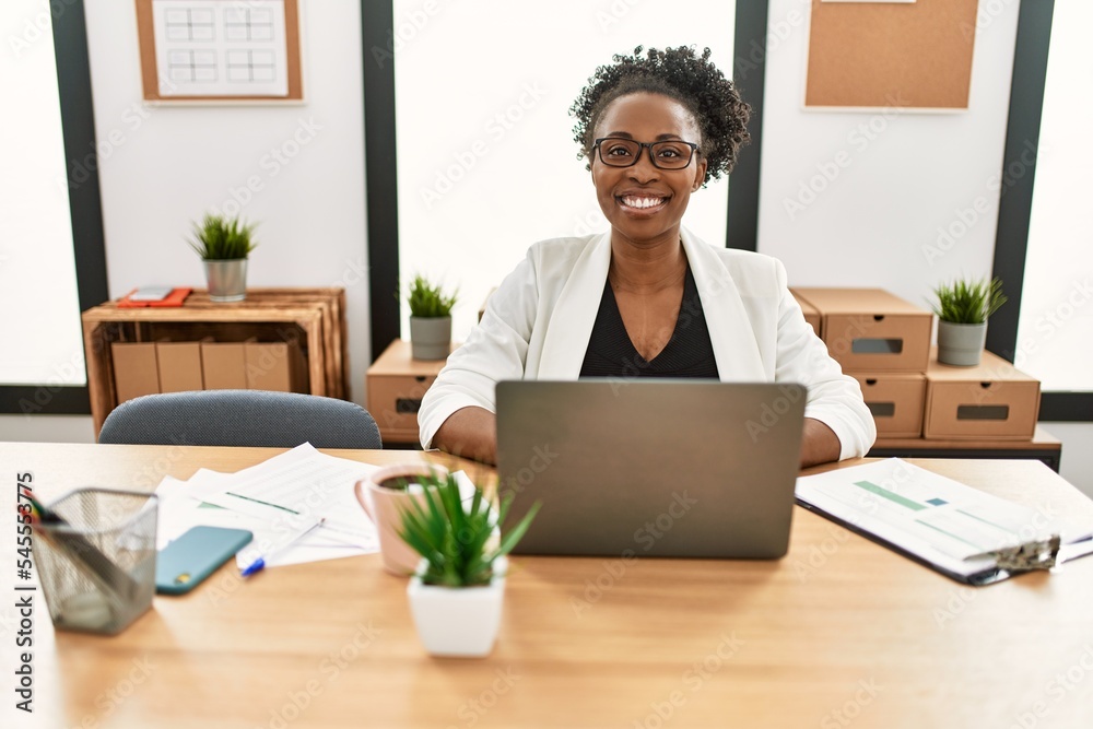 African american woman business worker using laptop working at office