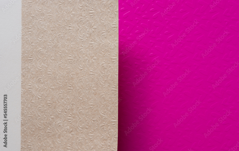 textured plain brown card and pink paper background textured plain brown card and pink paper background