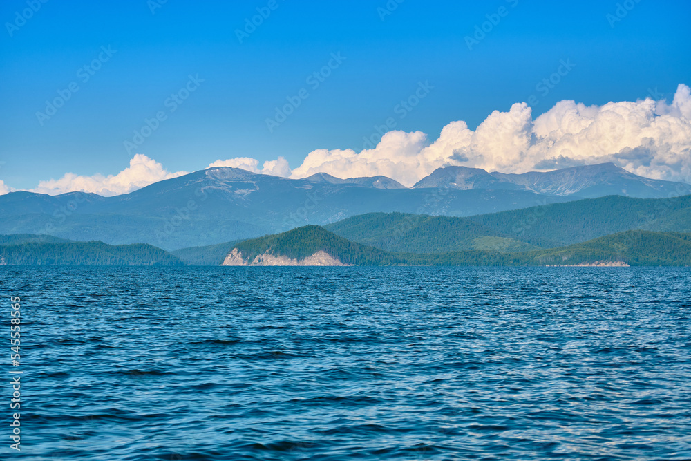 Chivyrkuysky Bay of Lake Baikal in the Buryat Republic in the daytime with a clear sun.