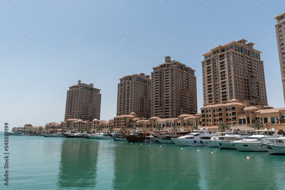 View of the Porto Arabia section of The Pearl's massive residential development in West Bay, Doha, Qatar. Accommodation center for the Qatar 2022 World Cup.