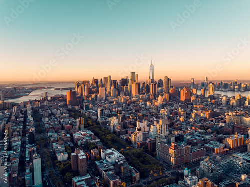 Sunrise above New York Lower Manhattan buildings. Clear sky, morning light © marchello74