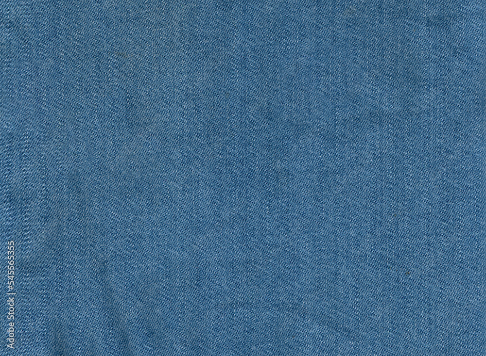 Texture of blue jeans. Surface of clothes Texture of blue jeans. Surface of clothes