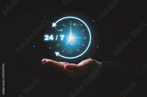 virtual 247 with clock on hand for worldwide nonstop and full-time  available contact of service concept.