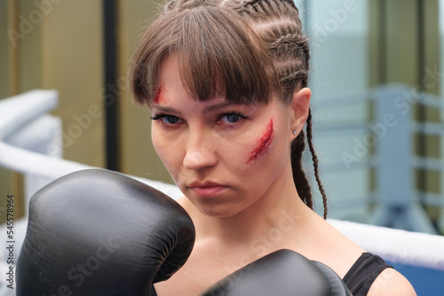 Female fighter with boxing gloves