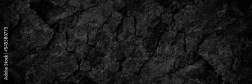Panel kuchenny z motywem Black rock texture. Rough mountain surface with cracks. Close-up. Dark stone background with space for design. Grunge. Banner. Wide. Long. Panoramic. 