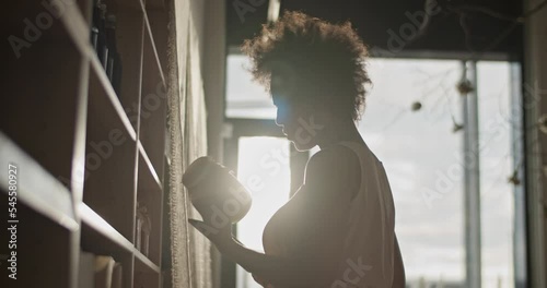 Woman with tablet working in online store