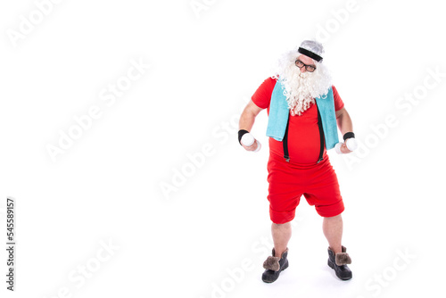 Funny Santa Claus goes in for sports. Man posing on a white background.