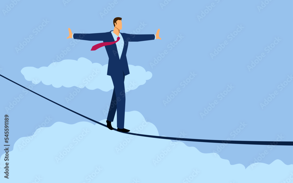 Fototapeta premium Businessman walking on a rope balancing himself so as not to fall