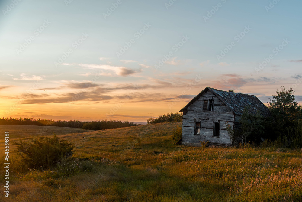 sunset with old abandoned house sunset with old abandoned house