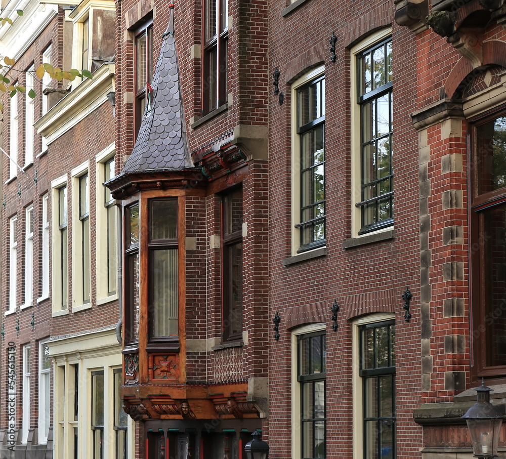 Fototapeta premium Amsterdam Reguliersgracht Canal House Facades Close Up with Bay Window and Carved Wooden Details, Netherlands