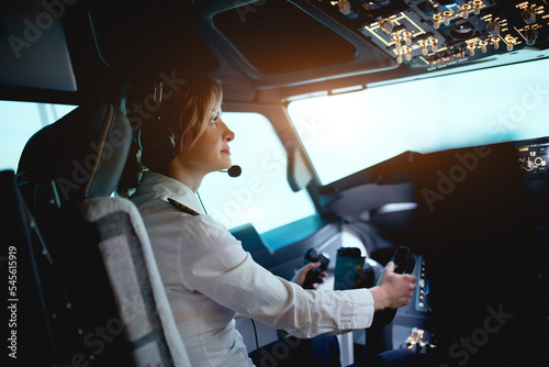 Wallpaper Mural Woman pilot in the cockpit