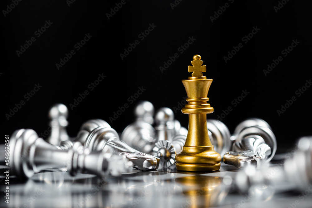 Chess game gold king stand out amongst the silver chess team. chess game strategic business leadership successful teamwork. business leader concept. strategy challenge business of successful. Chess game gold king stand out amongst the silver chess team. chess game strategic business leadership successful teamwork. business leader concept. strategy challenge business of successful.