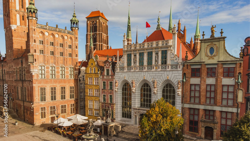 Beautiful view of Artus Court, Gdansk Town Hall and Basilica in Gdansk, Poland. Drone view in early fall.