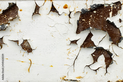 Texture of an old rusty surface with peeling paint