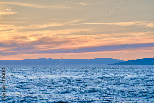 Sunset on Lake Baikal in the Barguzin Bay. Republic of Buryatia, Maksimikha settlement.