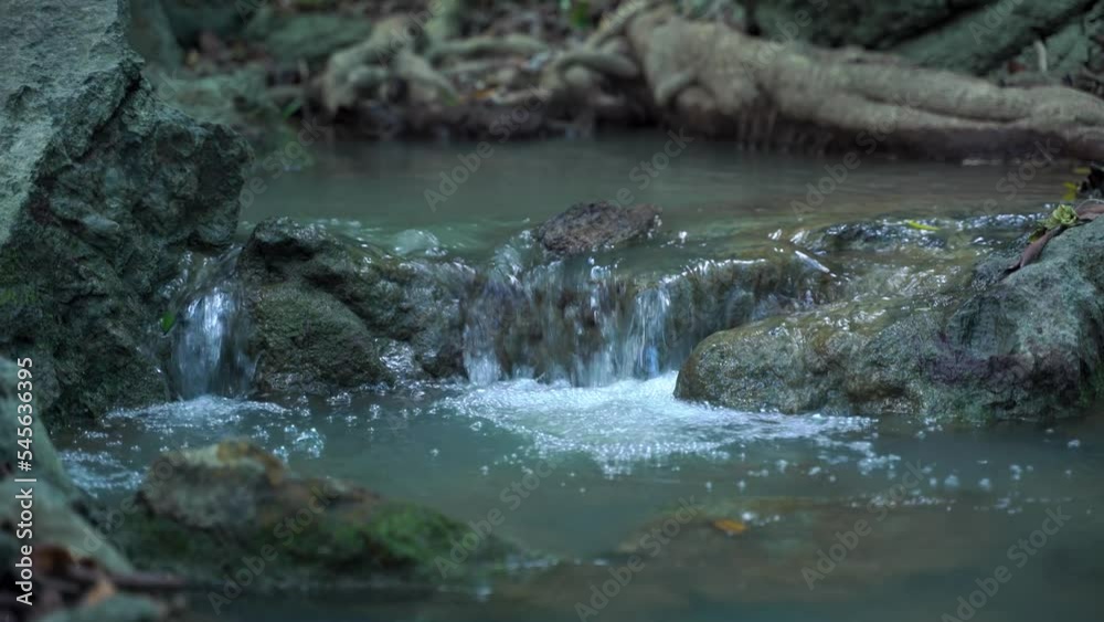 A small waterfall in Phang Nga, Thailand, a bright and refreshing waterfall suitable for vacations. Little known secret waterfall A small waterfall in Phang Nga, Thailand, a bright and refreshing waterfall suitable for vacations. Little known secret waterfall