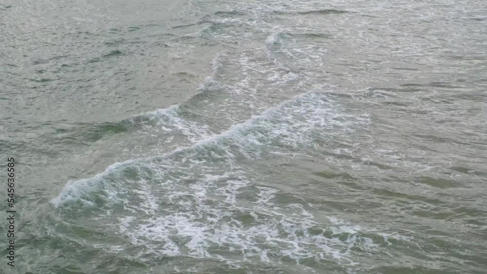 Aerial view of huge foamy waves of water crashing on sea spray Pacific Ocean California USA Aerial view of huge foamy waves of water crashing on sea spray Pacific Ocean California USA