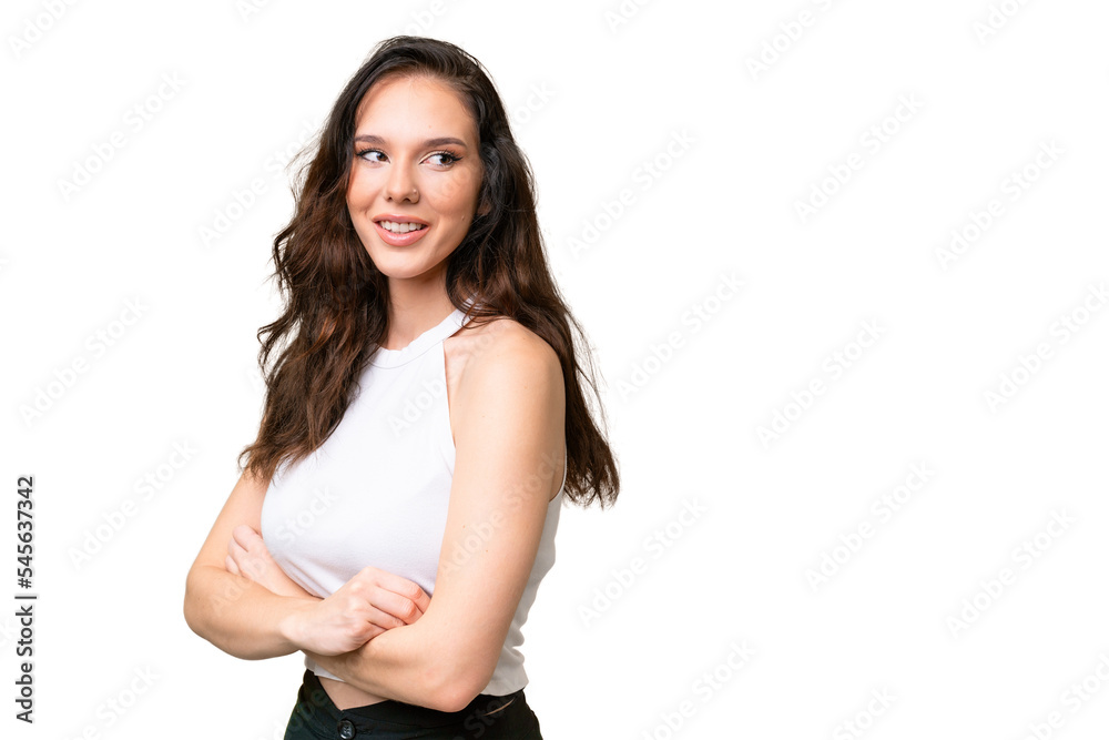 Young caucasian woman isolated over isolated background with arms crossed and happy Young caucasian woman isolated over isolated background with arms crossed and happy