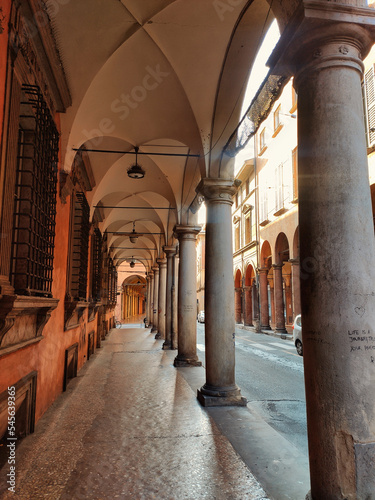San Vitale street, Garisenda tower seen from Maggiore street, Bologna city, Emilia Romagna, Italy photo
