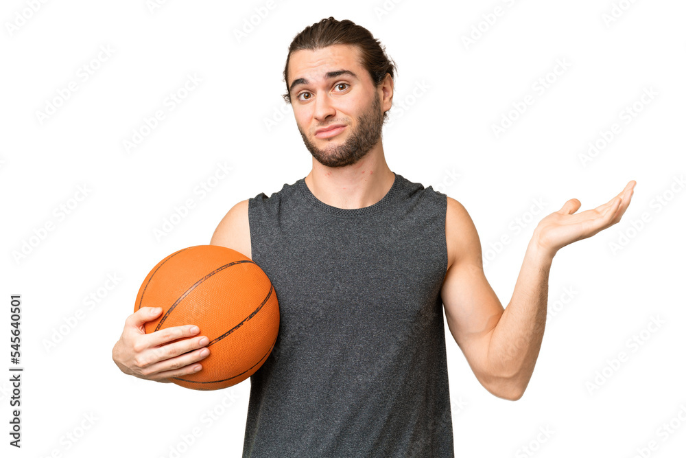Young basketball player man over isolated background having doubts while raising hands Young basketball player man over isolated background having doubts while raising hands