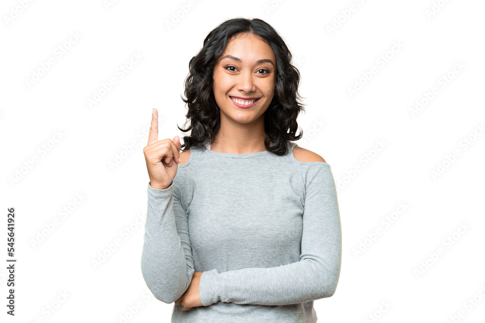 Young Argentinian woman over isolated background pointing up a great idea Young Argentinian woman over isolated background pointing up a great idea