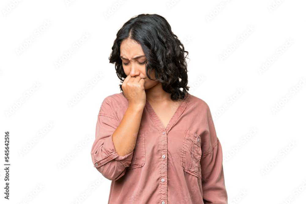 Young Argentinian woman over isolated background having doubts Young Argentinian woman over isolated background having doubts