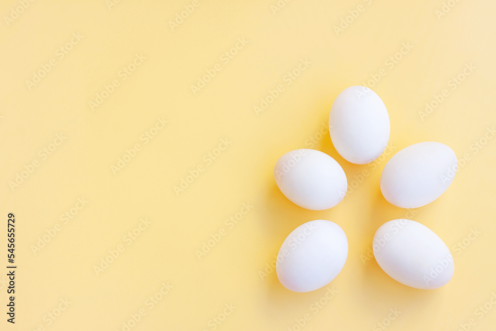 White eggs on yellow background, Duck eggs. White eggs on yellow background, Duck eggs.