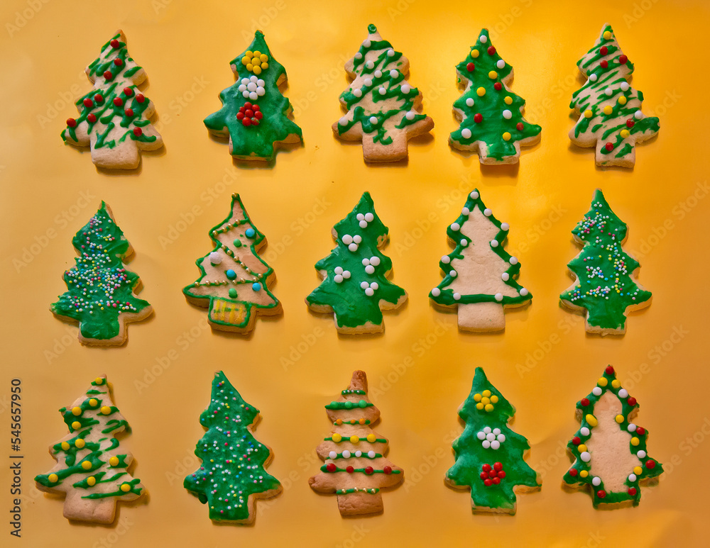 Gingerbread cookies on the golden background Gingerbread cookies on the golden background
