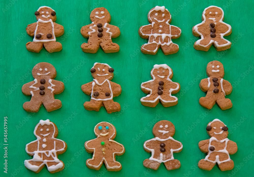 Gingerbread cookies on the green background Gingerbread cookies on the green background