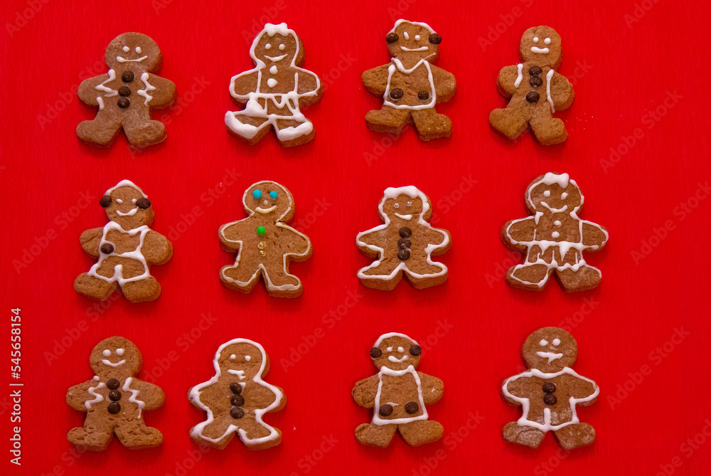 Gingerbread cookies on the red background