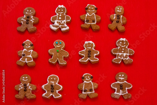 Gingerbread cookies on the red background