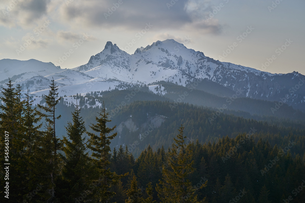 Obraz premium Aerial view over the mountains top. Winter landscape