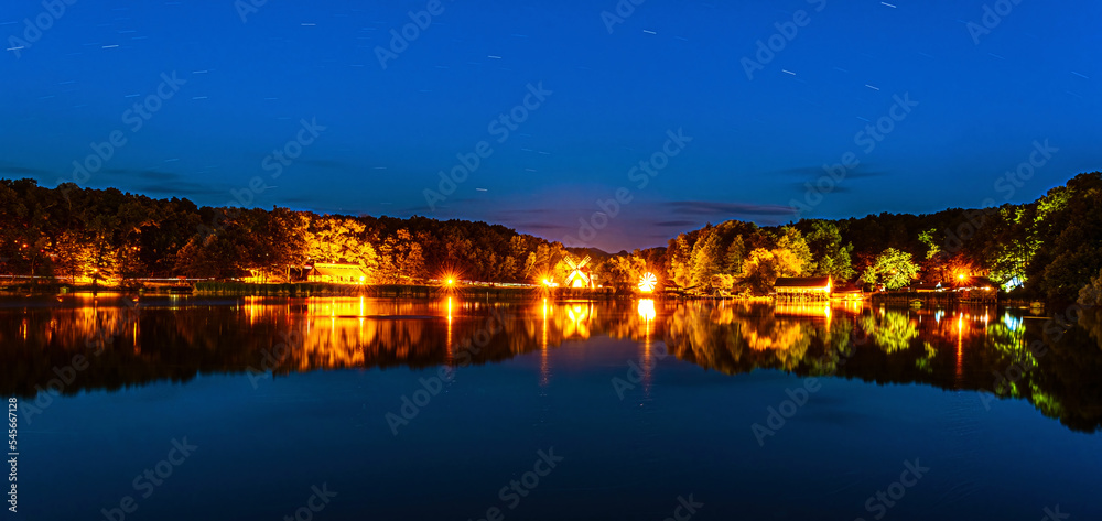 Landscape panorama with windmills at the blue hour