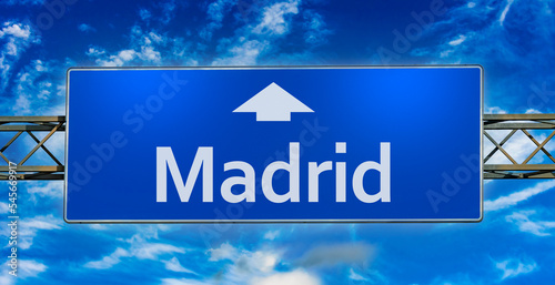 Road sign indicating direction to the city of  Madrid