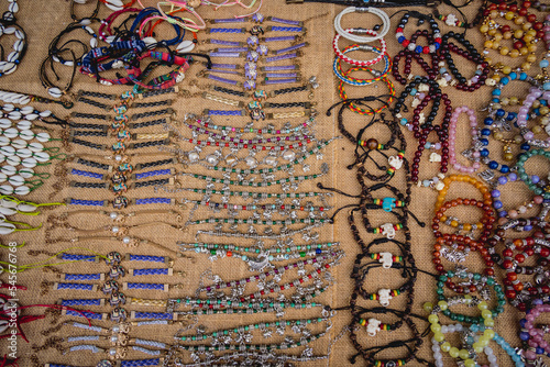 Many colorful bracelets from handcraft souvenirs shop