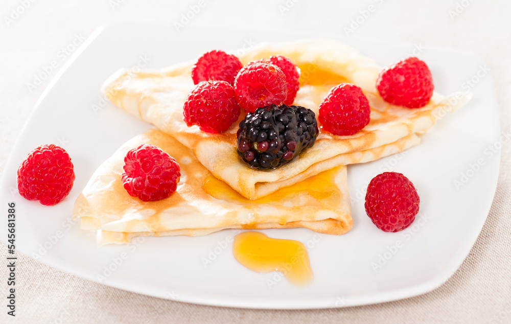 pancakes with raspberries, blackberries and honey pancakes with raspberries, blackberries and honey