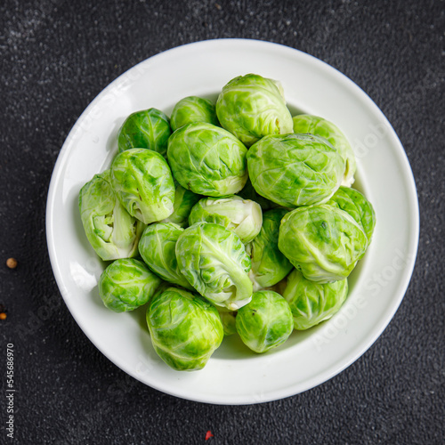 green Brussel sprouts raw vegetable food snack on the table copy space food background top