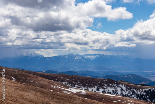 Panoramic view of the Karawanks (Karawanken) mountains seen from Grosser Sauofen (Ebersteiner Sau), Saualpe, Lavanttal Alps, Carinthia, Austria, Europe. Trekking in the Austrian Alps on cloudy day. photo