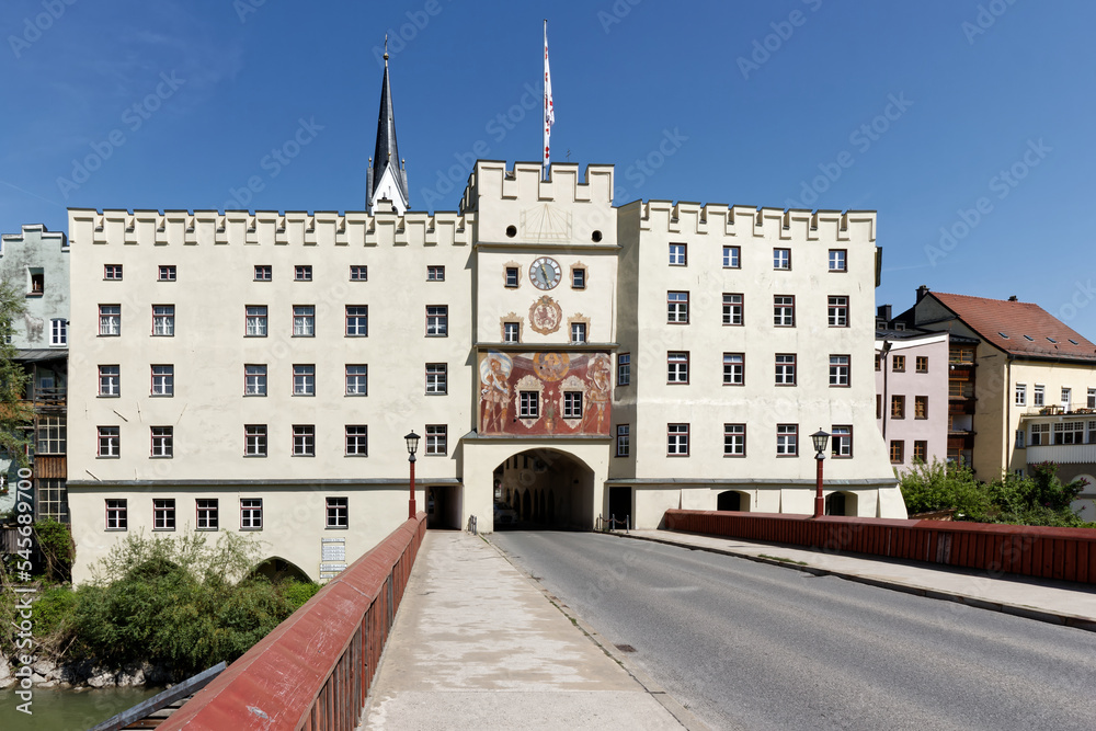 Gate to bavarian city Wasserburg am Inn. Bridge above river Inn.