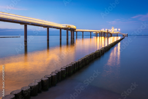 Seebrücke an der Ostsee in Koserow auf Insel Usedom am Abend photo