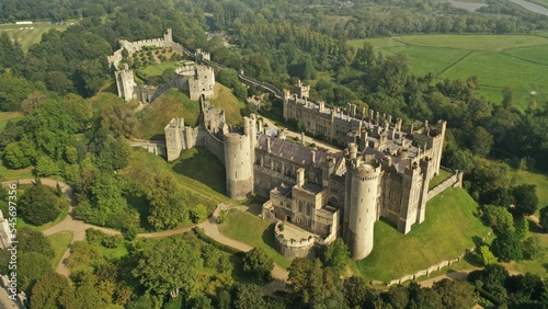 Aerial view of mesmerizing Arundel castle surrounded by green trees and fields