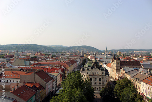 Panoramic view of Kosice Old city from St. Elisabeth Cathedral, scenic daytime cityscape with streets, red tiled roofs of medieval buildings and blue cloudy sky, urban skyline, Slovakia (Slovensko)