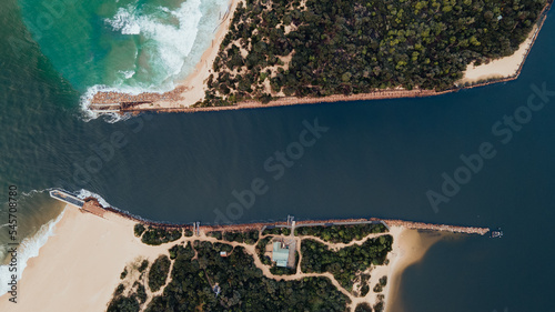 The Entrance at Lakes Entrance Victoria Australia showing warning signs in the channel for boating 