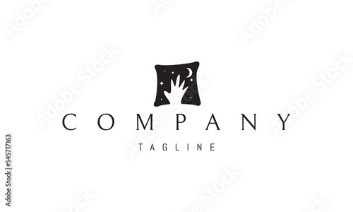 Vector logo on which an abstract image of a childs hand on a pillow against the background of the moon and stars.