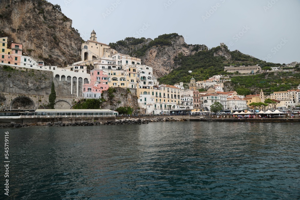 Scenic view of the colorful buildings by the sea in Amalfi, Italy